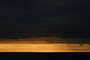 Madeira Island Landscape Drucke: Dramatic cloudy sky at sunset, Arco da Calheta