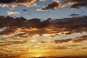 Arizona Sunset Drucke: Dramatic cloudy sky at sunset, backlight
