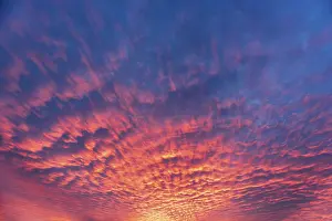 European Travel Images Drucke: Dramatic evening sky with red clouds after sunset