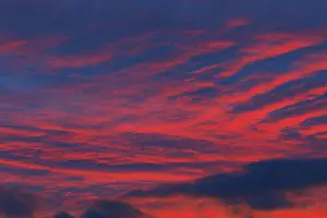 Atmospheric Sunset Germany Drucke: Dramatic evening sky at sunset