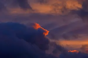 Evening Sunlight In Germany Drucke: Dramatic evening sky at sunset
