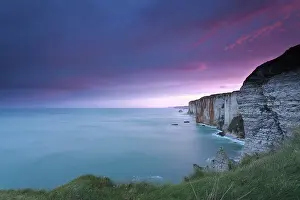 Deserted Rocky Coastline Europe Drucke: Dramatic fire sunrise over cliffs in ocean