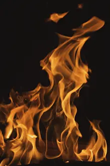 Dark Background Flames Drucke: Dramatic flames against A dark background