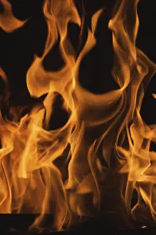 Dark Background Flames Drucke: Dramatic flames against A dark background