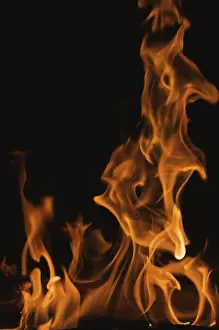 Dark Background Flames Drucke: Dramatic flames against A dark background