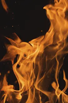 Dark Background Flames Drucke: Dramatic flames against A dark background