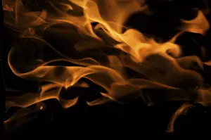 Dark Background Flames Drucke: Dramatic flames against A dark background