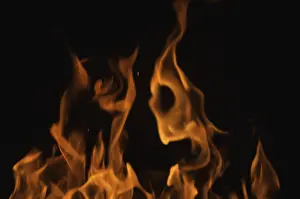 Dark Background Flames Drucke: Dramatic flames against A dark background