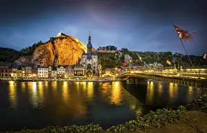 Uninhabited European Landmarks Drucke: Dramatic night scene of Dinant ton and its bridge with flags
