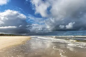 Uninhabited North Sea Shoreline Drucke: Dramatic rain clouds on the North Sea beach