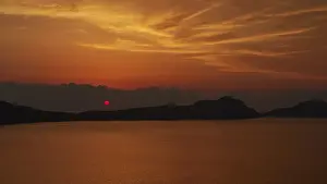 Peloponnese Landscape Photography Drucke: A dramatic red sunset, the landscape appears in backlight