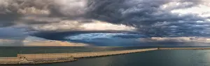 Deserted Beach Storm Drucke: Dramatic sky and clouds during a storm over Mediterranean Sea