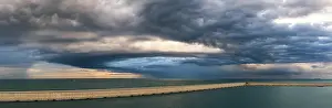 Cloudy Skies In Southern Europe Drucke: Dramatic sky and clouds during a storm over Port of Valencia