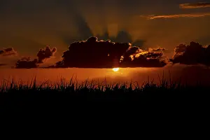 Mauritius Sunset Drucke: Dramatic sunset behind clouds, Chebel