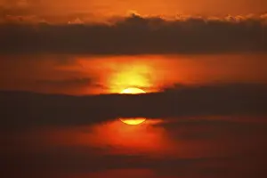 Dramatic European Landscape Drucke: Dramatic sunset behind clouds, Schleswig-Holstein