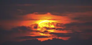 Evening Sun Germany Drucke: Dramatic sunset behind clouds, Schleswig-Holstein
