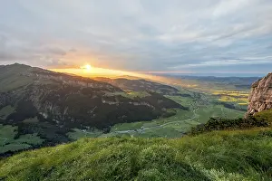 Deserted Mountain Range Europe Drucke: Dramatic sunset with cloudy skies in the mountains on the Alpsigel in Alpstein