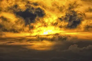 Overcast Sky In Germany Drucke: Dramatic sunset under cloudy sky