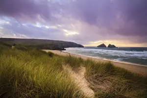 Deserted Beach Cornwall Drucke: A dramatic sunset at Holywell bay cornwall