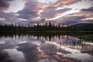 Dramatic Sunset Norway Drucke: Dramatic sunset by the river Namsen with reflection