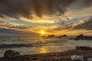 Adriatic Sea Coastline Drucke: Dramatic sunset sky over beach rocks and waves