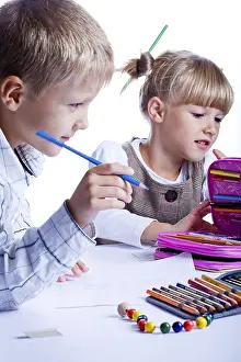 Bücher Drucke: Zwei Zeichenschüler am Tisch.