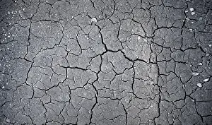 Deserted Full Frame Image Drucke: Dried out soil, background image, grey