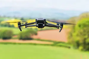 Remote Controlled Aircrafts Drucke: Drone in flight over fields and farms
