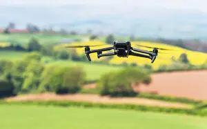 Remote Controlled Aircrafts Drucke: Drone in flight over fields and farms