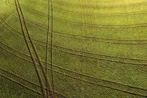 Drone Image Of Agricultural Landscape Drucke: Drone image, structures on a mown meadow with ruts