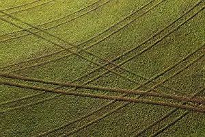 Drone Image Of Agricultural Landscape Drucke: Drone image, structures on a mown meadow with ruts
