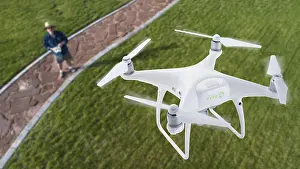 Unmanned Aerial Vehicle UAS Drucke: Drone quadcopter (UAV) in air above pilot with remote controller