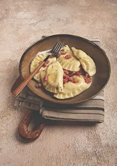 Traditional Polish Dish Drucke: Dumplings, with fried prosciutto
