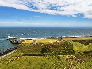 Aerial Landscape Photo With Drone Drucke: Dunstanburgh Castle from a drone