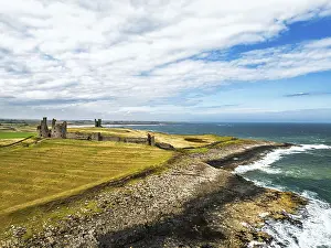 Historic British Castles UK Drucke: Dunstanburgh Castle from a drone