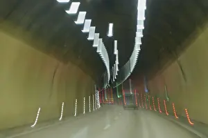Light Trail Photography Drucke: Dynamic light strips in a tunnel create blur and an impression of speed
