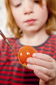 Easter Egg Painting Drucke: Easter, child painting an easter egg