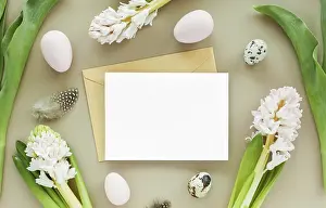 Pastel Colored Background Drucke: Easter mockup with empty letter and easter eggs on a pastel colored background