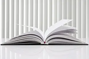 Bright White Background Cutout Drucke: Education concept. opened book with reflection on white