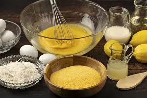 Kitchen Food Photography Drucke: Egg is mixed with sugar, surrounded by polenta