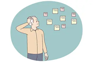 Healthcare System Challenges Drucke: Elderly man making notes suffering from memory loss