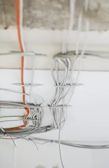 Electrical Wire Connection Drucke: Electric cable on the ceiling of a flat