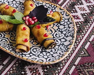 Tropical Fruit Platter Drucke: Elegant presentation of dolma on a patterned plate