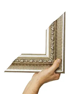 White Background Picture Frame Drucke: Element of the frame in hand isolated on a white background