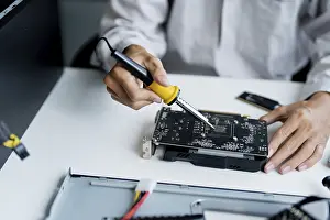 Electronic Repair Shop Drucke: IT Engineer installing Hardware Equipment Development Facility Engineer Maintenance computer Motherboard Electronic