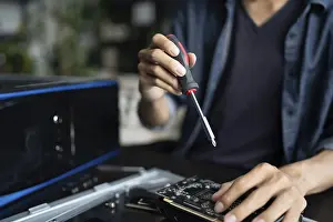 Electronic Repair Shop Drucke: IT Engineer installing Hardware Equipment Development Facility Engineer Maintenance computer Motherboard Electronic