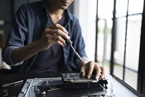 Electronic Repair Shop Drucke: IT Engineer installing Hardware Equipment Development Facility Engineer Maintenance computer Motherboard Electronic