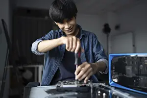 Electronic Repair Shop Drucke: IT Engineer installing Hardware Equipment Development Facility Engineer Maintenance computer Motherboard Electronic