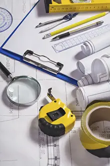 Magnifying Glass Image Drucke: Engineer tools on blueprint