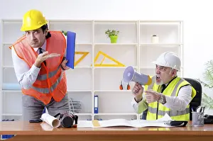 Single Person Working Drucke: Two engineers colleagues working under project
